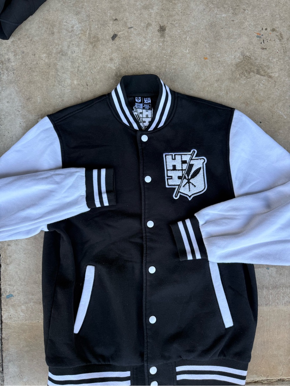 Hawaii's Finest Black and White Varsity Jacket with Embroidered Crest